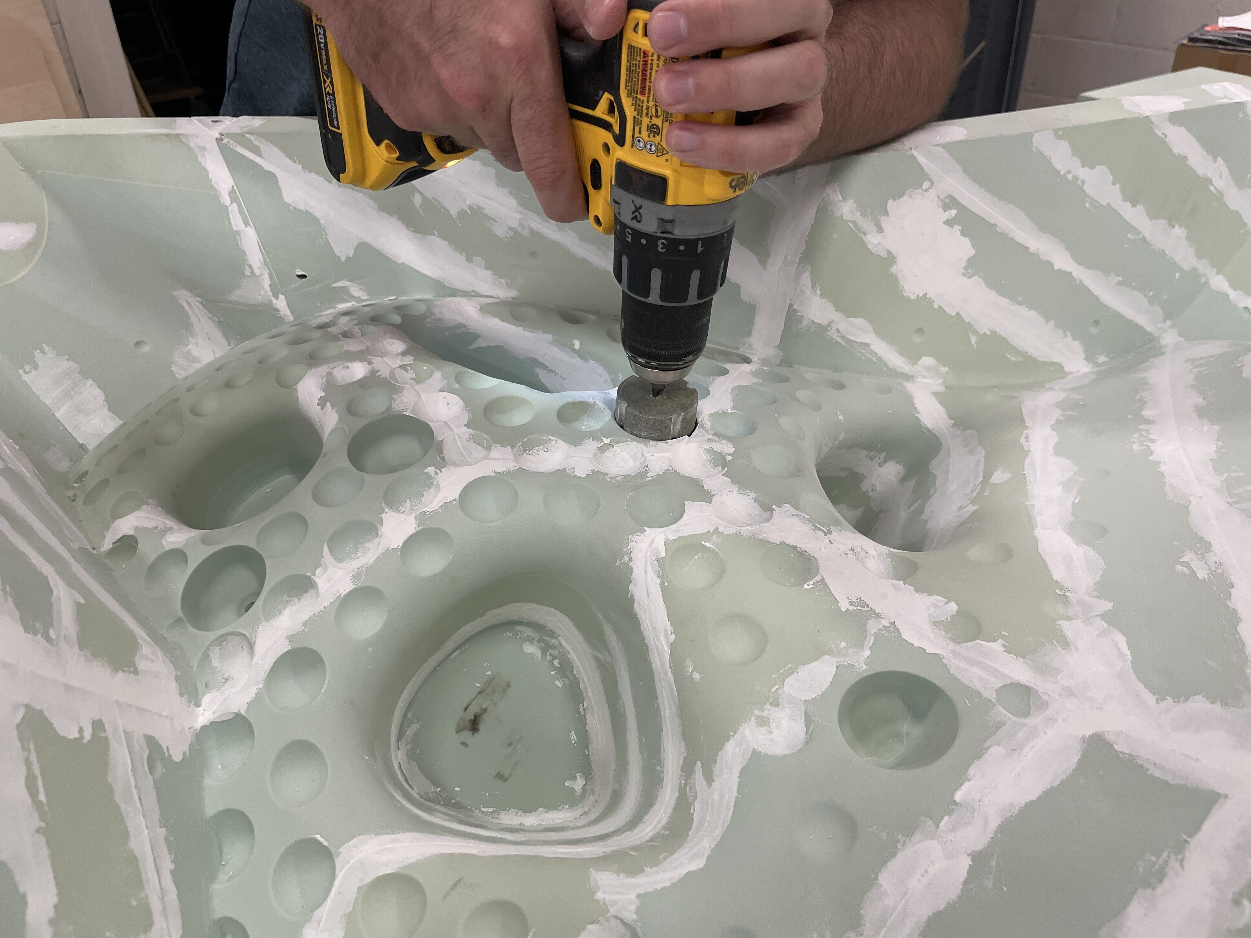 fraghog being used to cut geometry into the mold